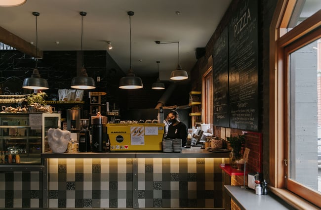 Counter with blackboard menu on the wall at Vogel Street Kitchen, Dunedin.