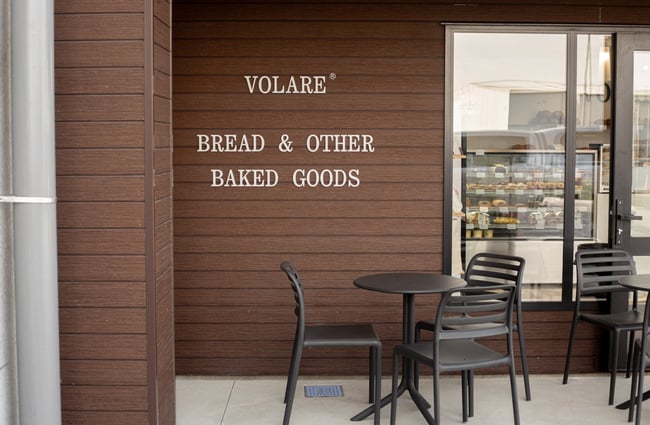 Volare Bread building exterior and signage on the wall.