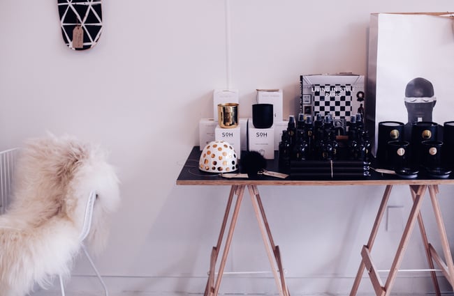 Trestle table displaying items for sale.