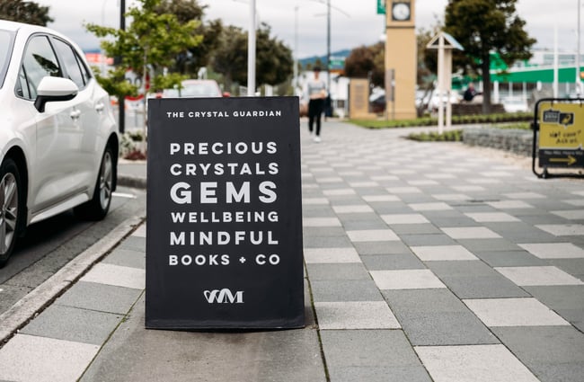 Sign on the street advertising VVITCHMOUNTAIN.