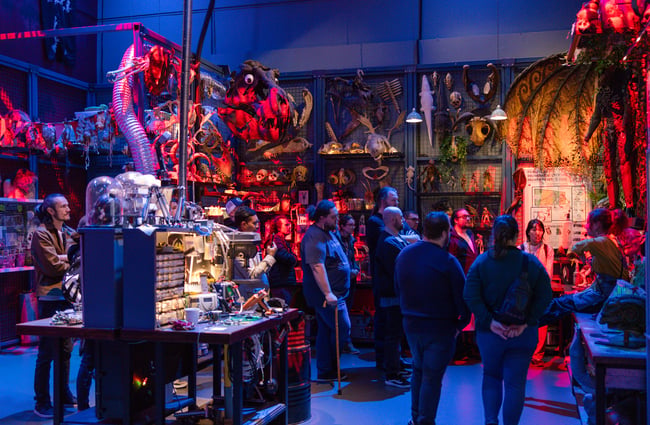 People in a group inside Weta Workshop.
