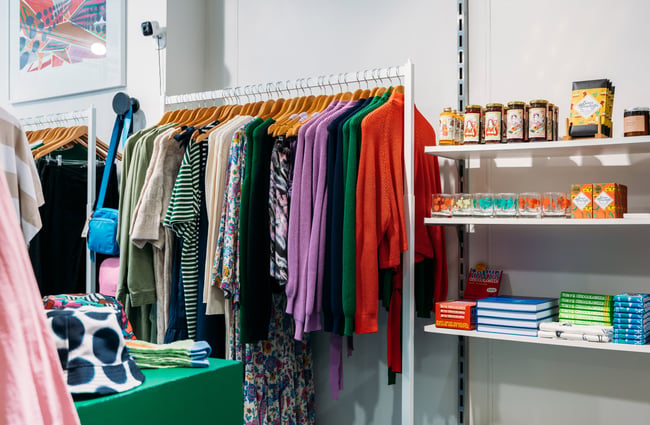 Colourful clothes and candles displayed inside Wanda Harland in Petone.