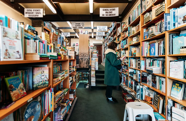 A woman browsing books.