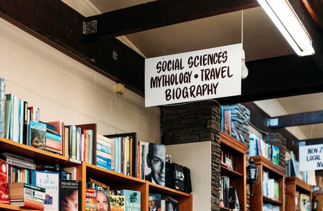 A sign hanging from a ceiling.
