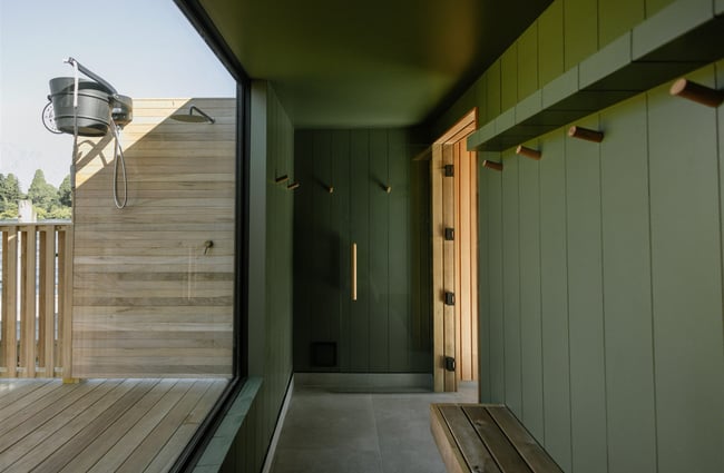 Green changing area at Watershed Saunas in Queenstown
