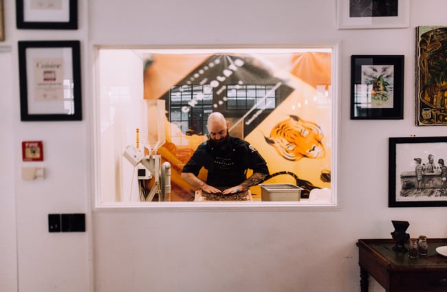 A man working with chocolate in the factory.
