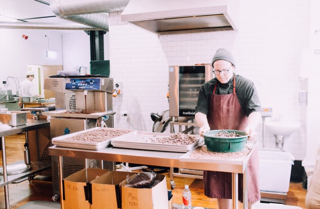 A man making chocolate in the factory.