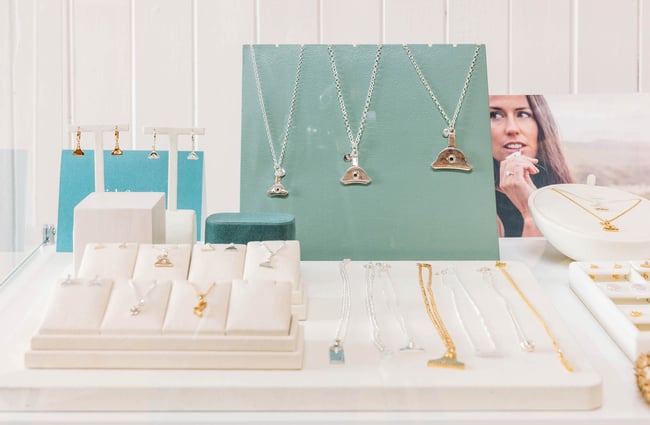 Collection of silver and gold dog whistle necklaces