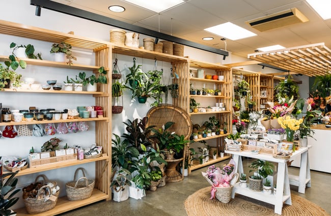 The busy interior of a florist shop.