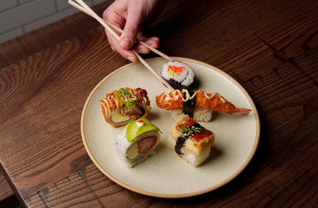 A close up of plate of sushi.