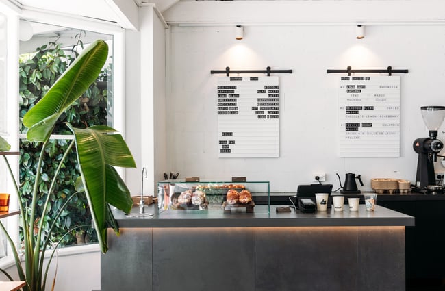 The white and black counter in a Queenstown cafe.