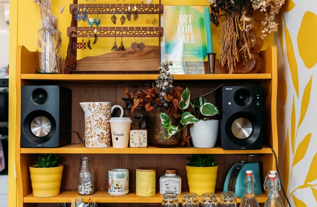 Reusable cups on the shelf at Wooden Spoon.