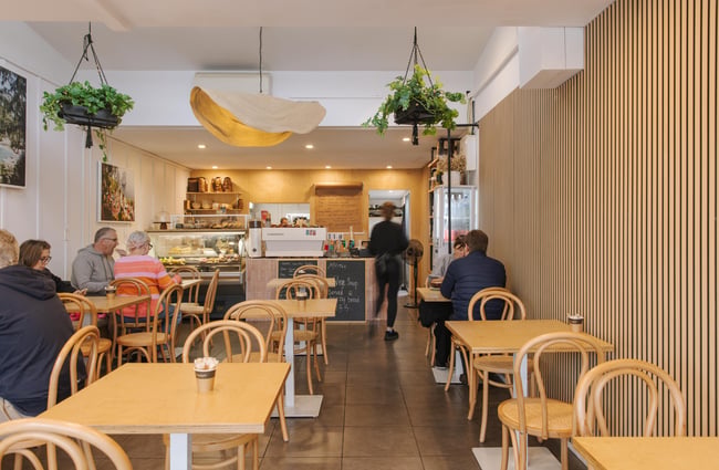 Customers in the cafe space at Woods Cafe.