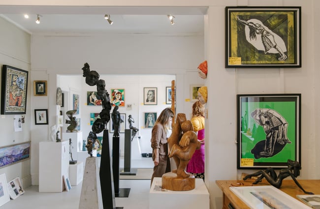 A woman browsing artworks inside York Street Gallery in Timaru.