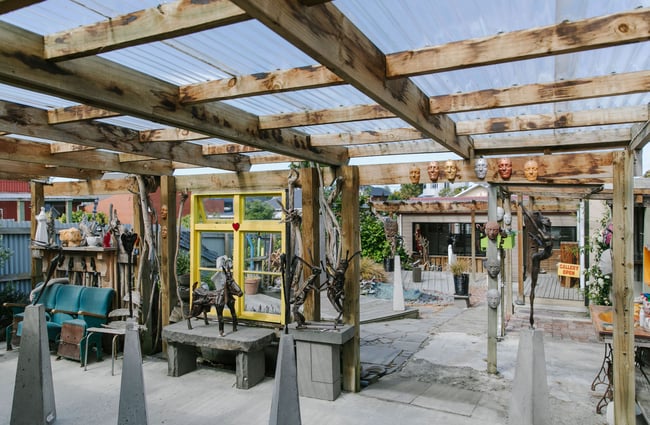 The outdoor gallery space with sculptures scattered around York Street Gallery in Timaru.