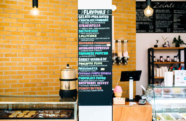 Colourful chalkboard gelato menu.