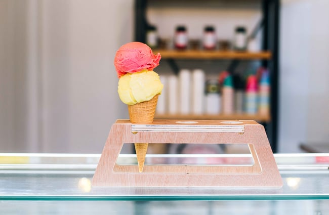 Double scoop ice cream on a freezer.