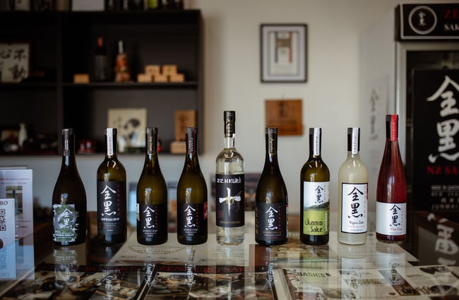 Range of Zenkuro sake on table at brewery and shop in Queenstown