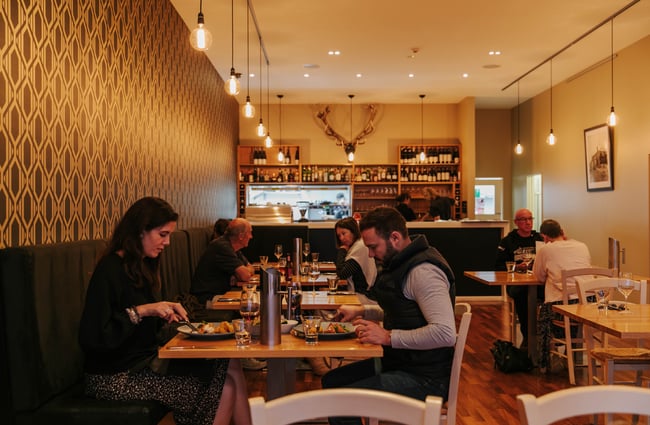Couple eating their meal at Zephyr.