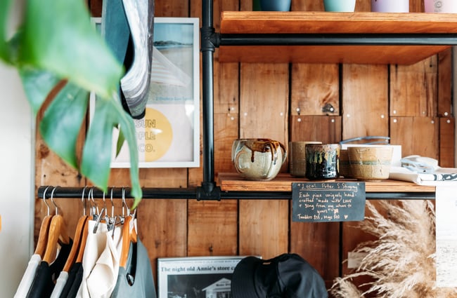 Hand made ceramics on a shelf.