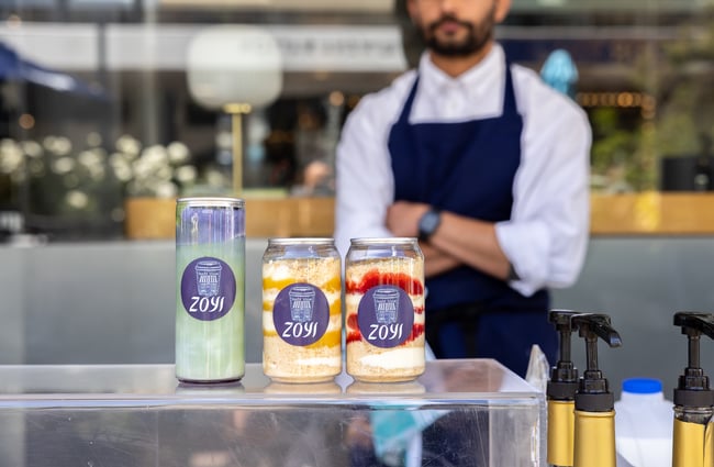 Desserts and drinks in cans on display at Zoyi.