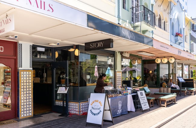 Table set up outside building with treats from Zoyi.