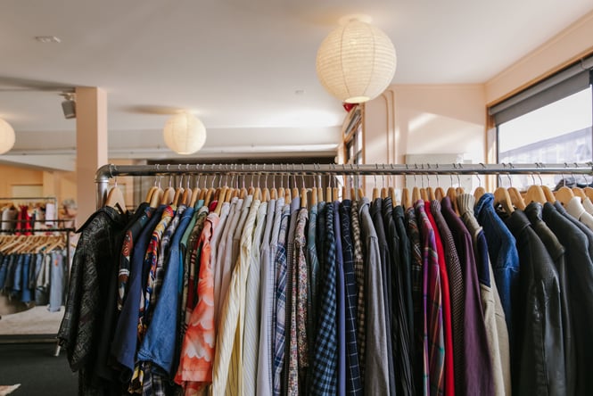 Close up of secondhand shirts on rack at Nifty in Christchurch