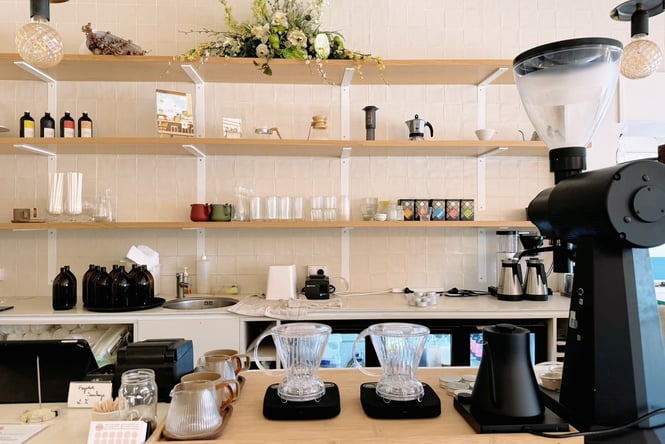 Coffee brewing equipment on the counter at Comes & Goes café in Petone.