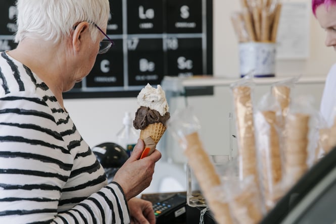 Customer holding her Gelato Lab ice cream.