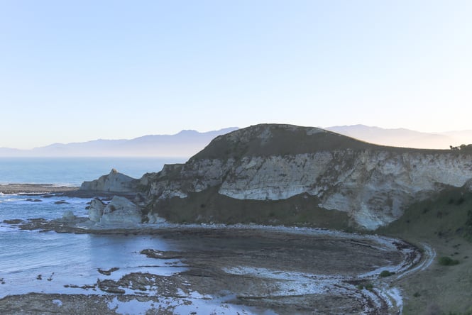 Sandy bay with cliffs on Kaikōura Peninsula Walkway, Kaikōura.