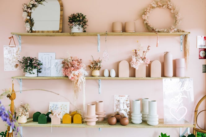 Vases on shelves at Le Fleur Florist.