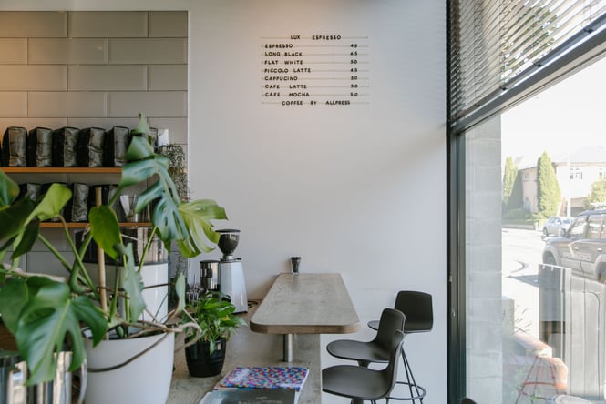 The bench seating next to the counter inside Lux Espresso Christchurch.