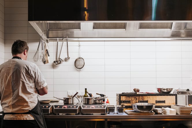 A chef working in the kitchen.