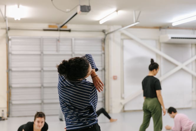 Woman dancing at Movement Art Practice.