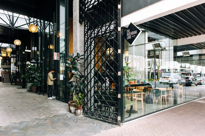 The entrance to Riverbank Lane and Cafe Kopi.