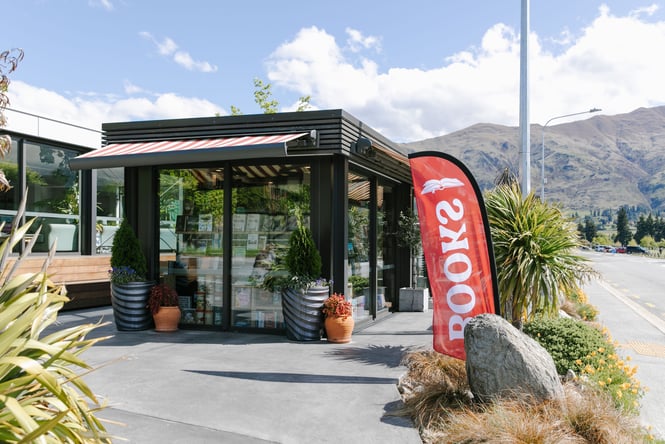 The outside of The Next Chapter, Wānaka on a sunny day.