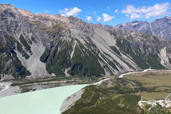 View of mountains and lake from the top of the Sealy Tarns Track.