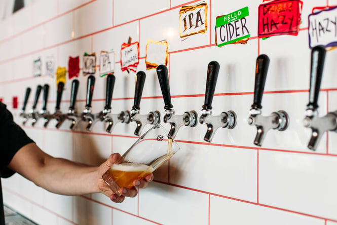 Wall of beer taps at Abandoned Brewery.