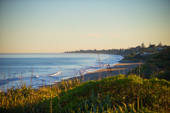 Sandy beach and coastline of Paekākāriki beach.