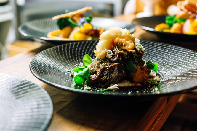 Food dishes on the pass at Nero.
