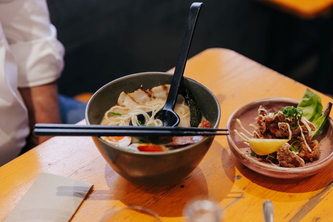 Bowl or Ramen next to fried chicken in Ramen Ria