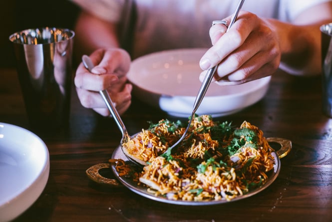 Biryani being served at a table.