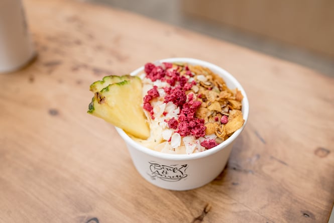 A smoothie bowl on a table.