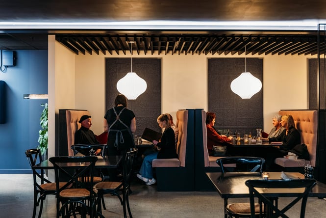 Customers sitting at a table.