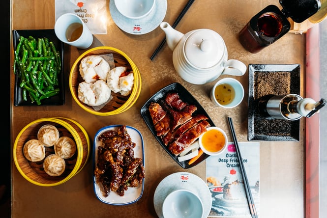 A flatlay of food. on a table at Dragons.