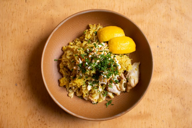 A plate of Kedgeree on a table.