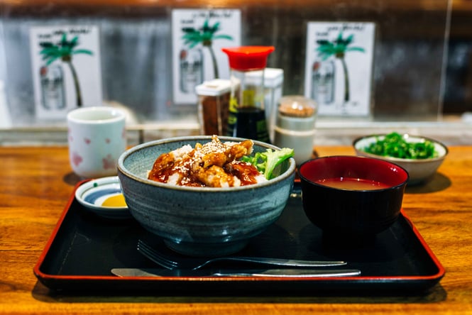 Japanese food on a tray.