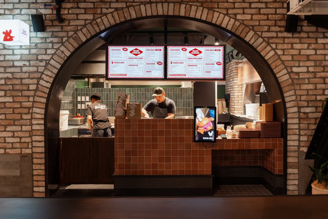 The counter of Crack Chicken in the underground Willis Lane food court.