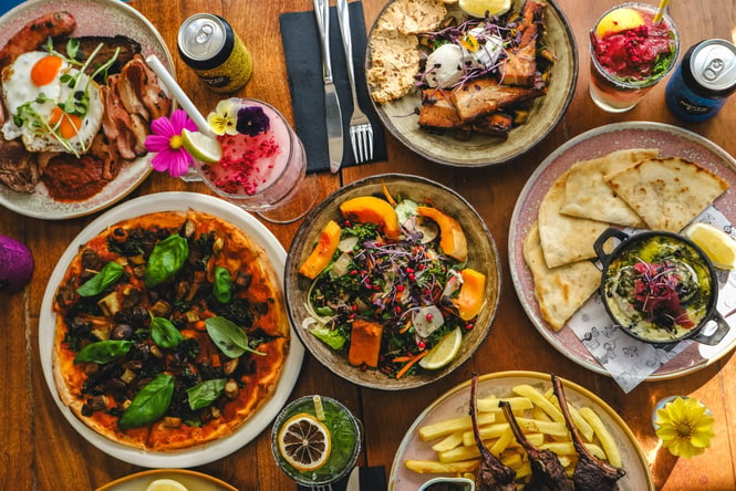 Flat lay of numerous dishes on the table.