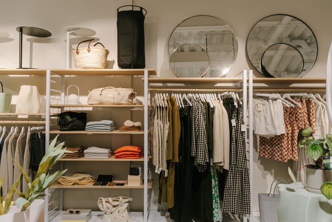 Clothes on racks on display at A&C Homestore.